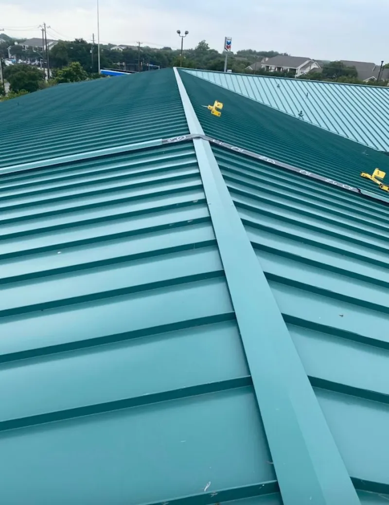 Green commercial metal roof ridge and valley for Metal Roof Repair in Whitman