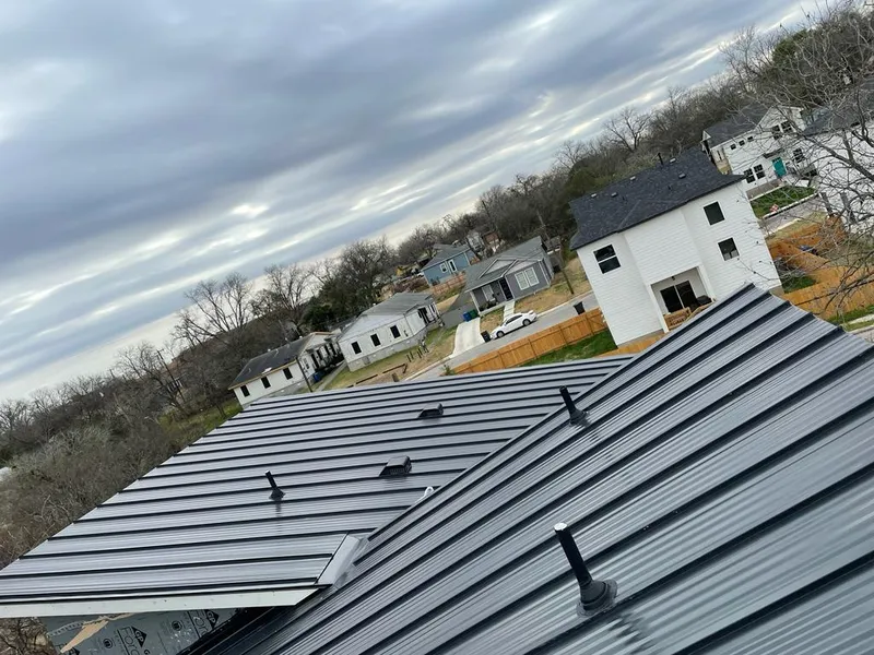 Standing seam metal roof panels with vents for Skylight Repair in Whitman